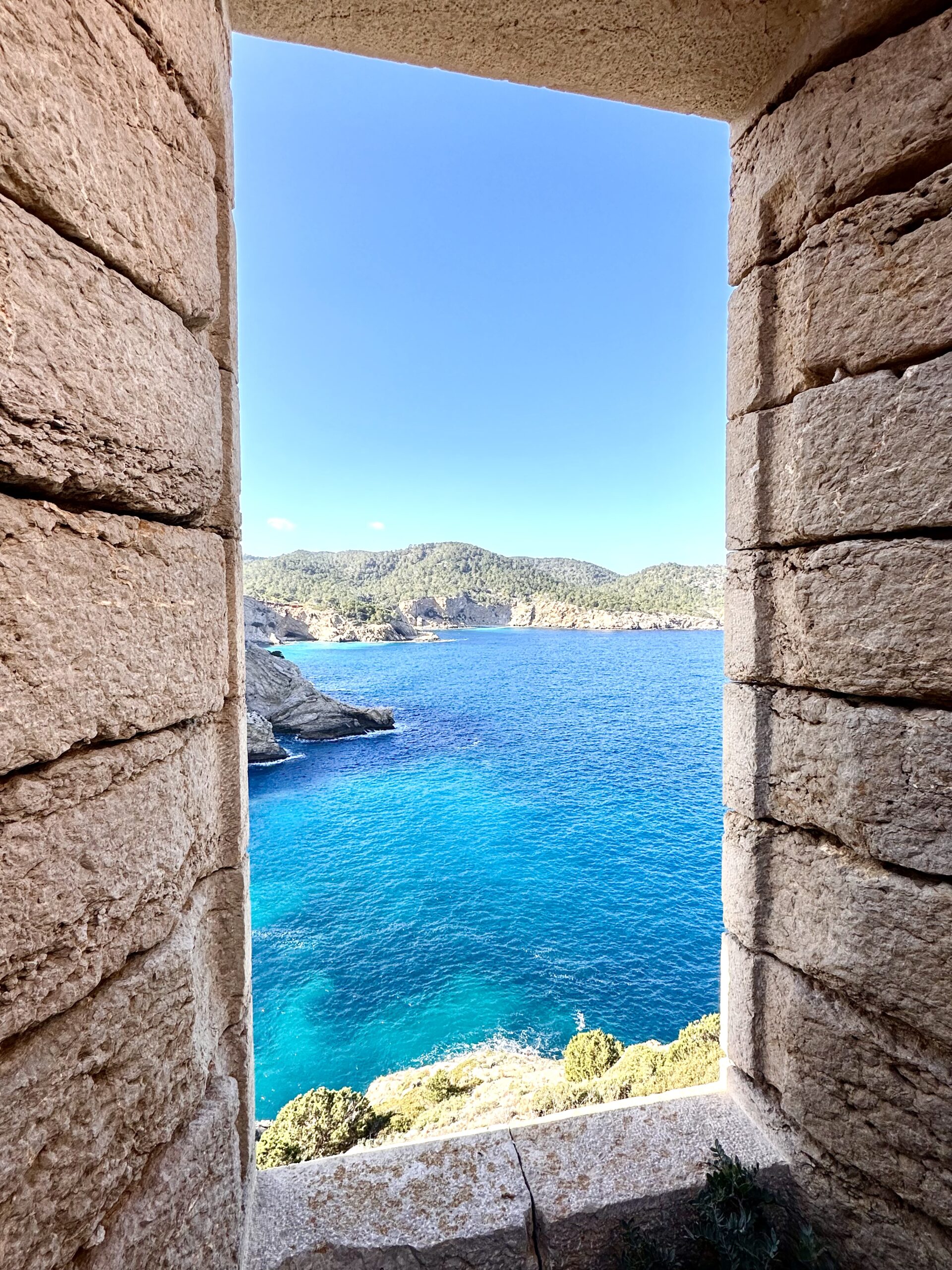 Ibiza cliffs and turquoise sea near Sa Punta Grossa